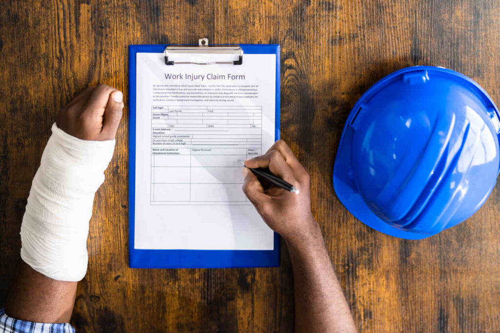 worker filling comp form