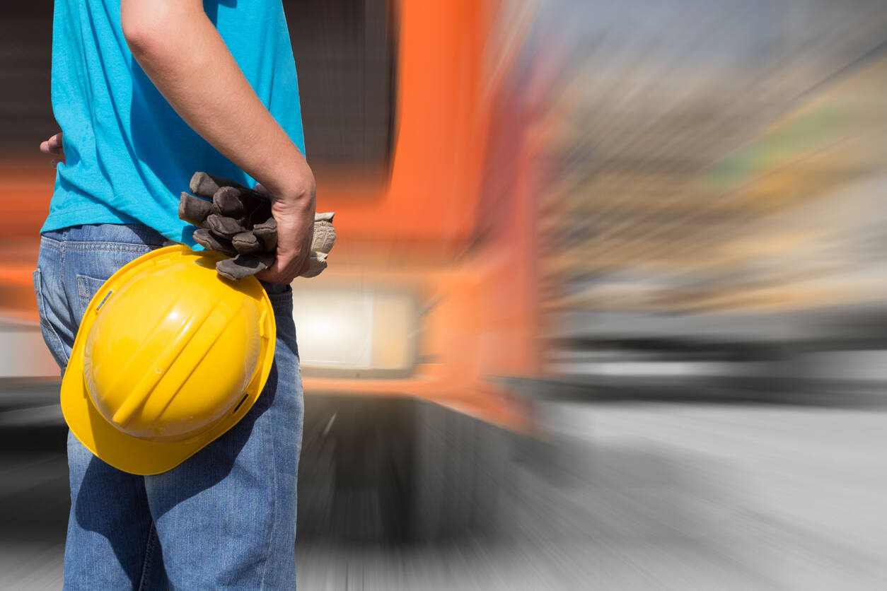 Construction worker and truck
