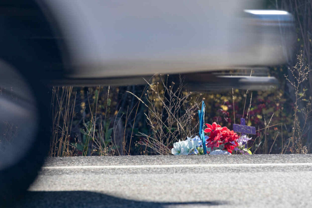 Road side memorial along the highway Families Honor Fallen Linemen After Deadly Eden Work Zone Crash
