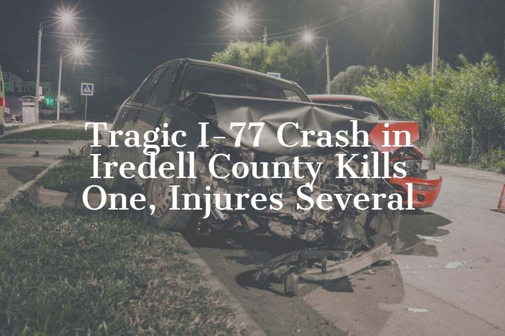 Iredell County I-77 crash scene showing a heavily damaged vehicle after a collision with a pulled-over car, with emergency response vehicles and streetlights in the background.